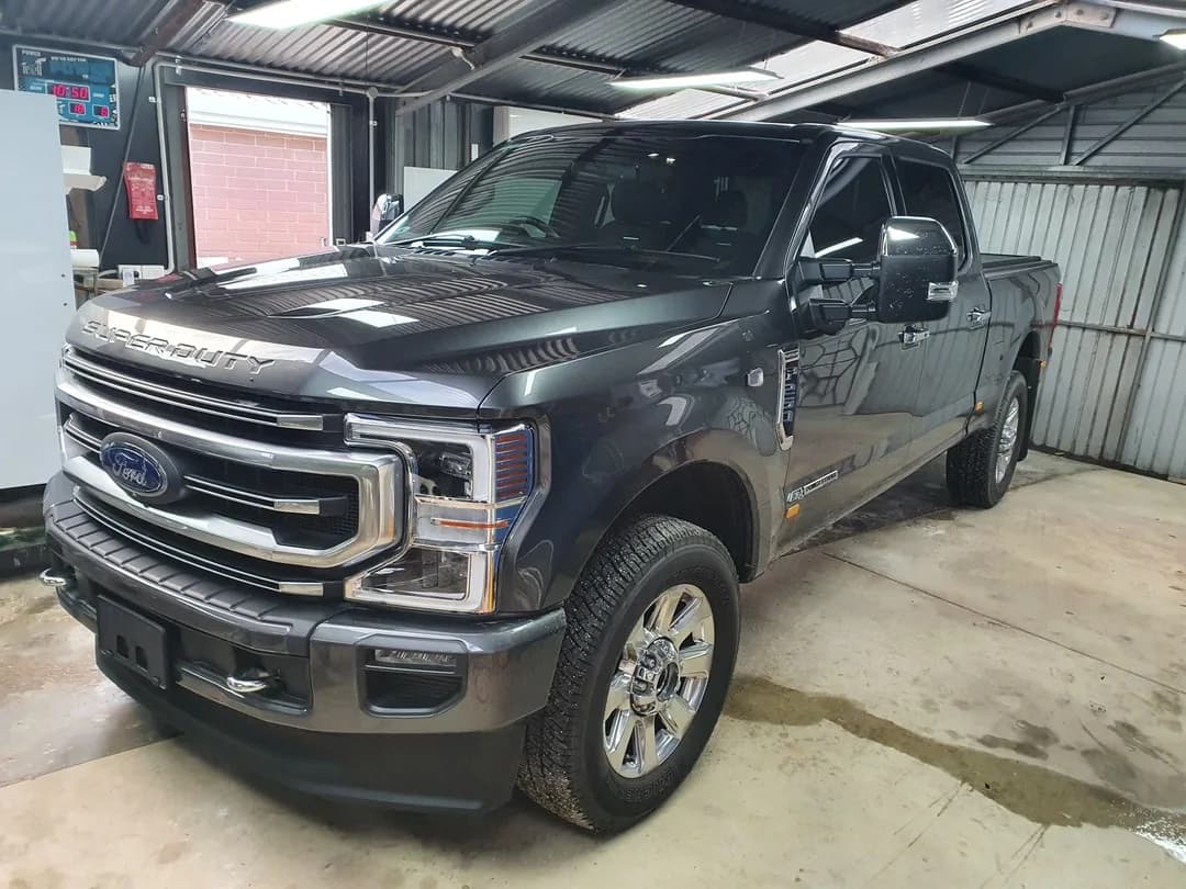 Grey Ford F-250 with dark window tint by Pro Tint Adelaide