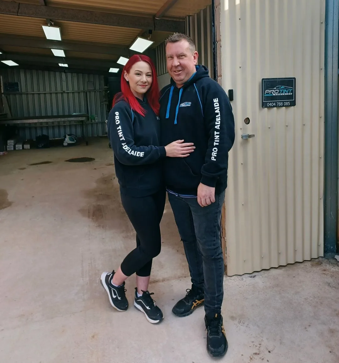 Troy and Maybellene, the family team behind Pro Tint Adelaide, in their workshop