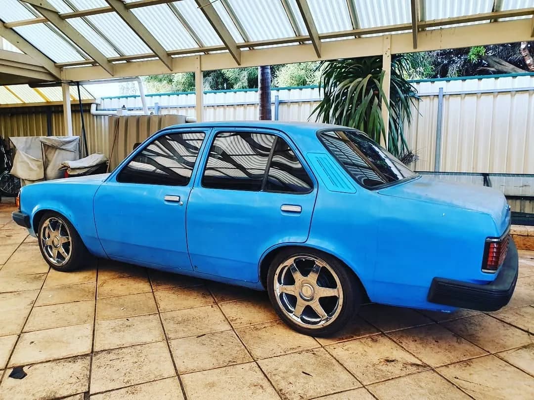 Blue Holden Torana with tinted windows